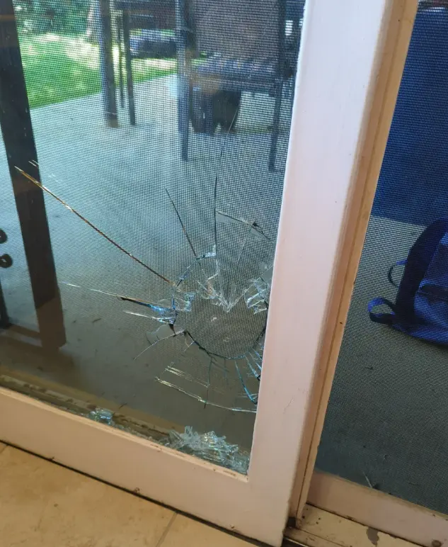 Sliding door glass before repair