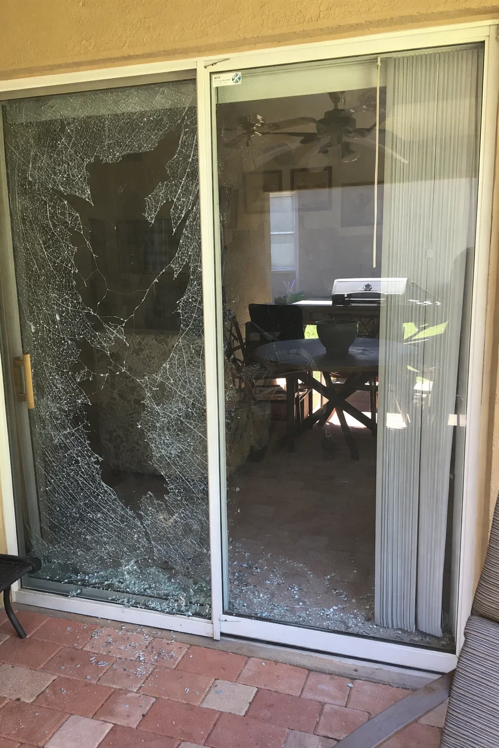 Sliding door glass before repair
