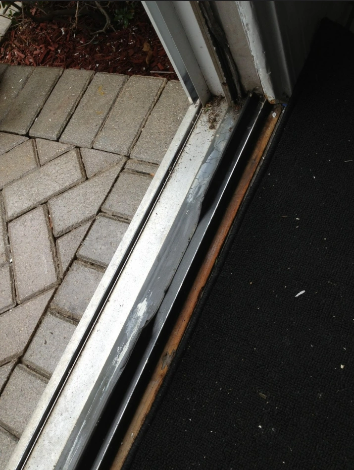 Sliding door glass before repair